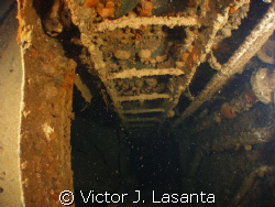 welcome to the engine room, this are the ladders that tak... by Victor J. Lasanta 